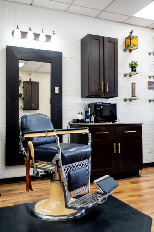 Barber chair — precision grooming at Tracy Bryan's Gentlemen Salon